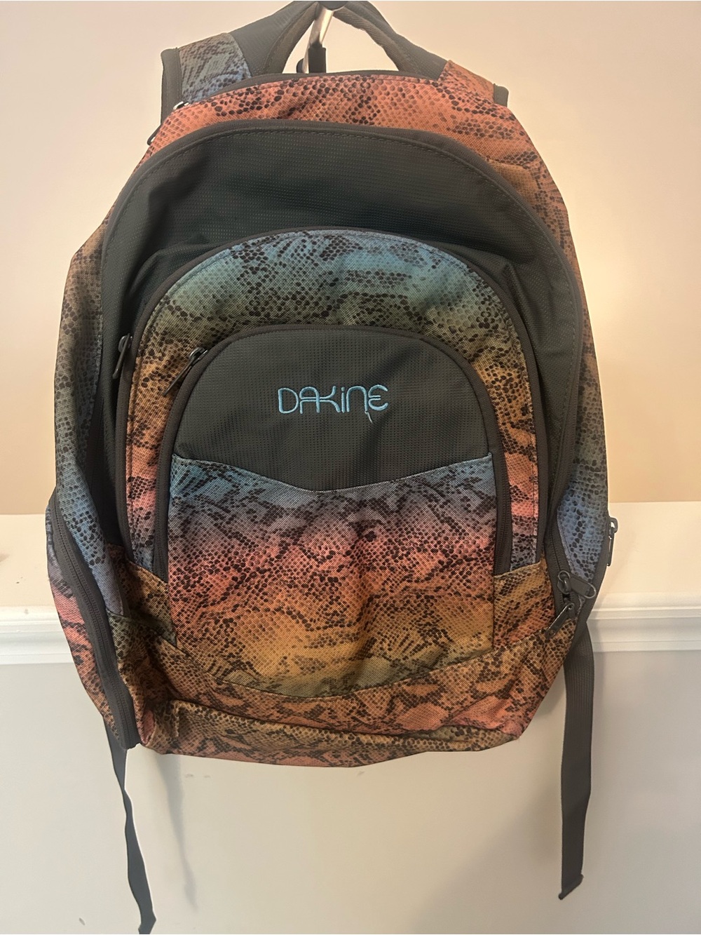 Dakine Rainbow Snake-Print Backpack in Blue, Green, Orange and Pink